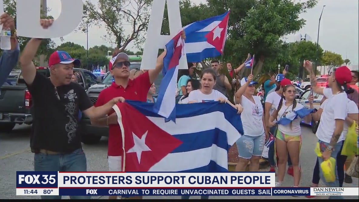 Protesters rally in support of Cuban people